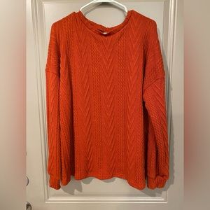 Orange cable knit sweater